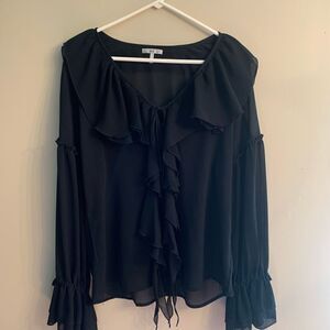 Two women’s tops, size Large